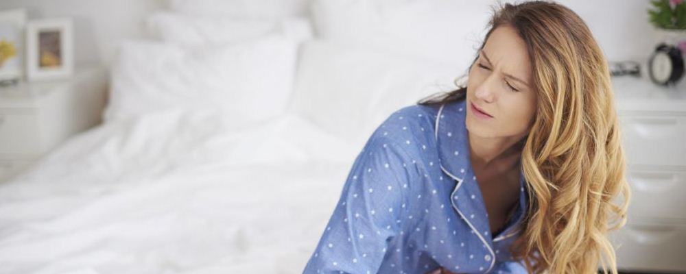 女性痛经应该如何缓解 止痛片不宜多吃